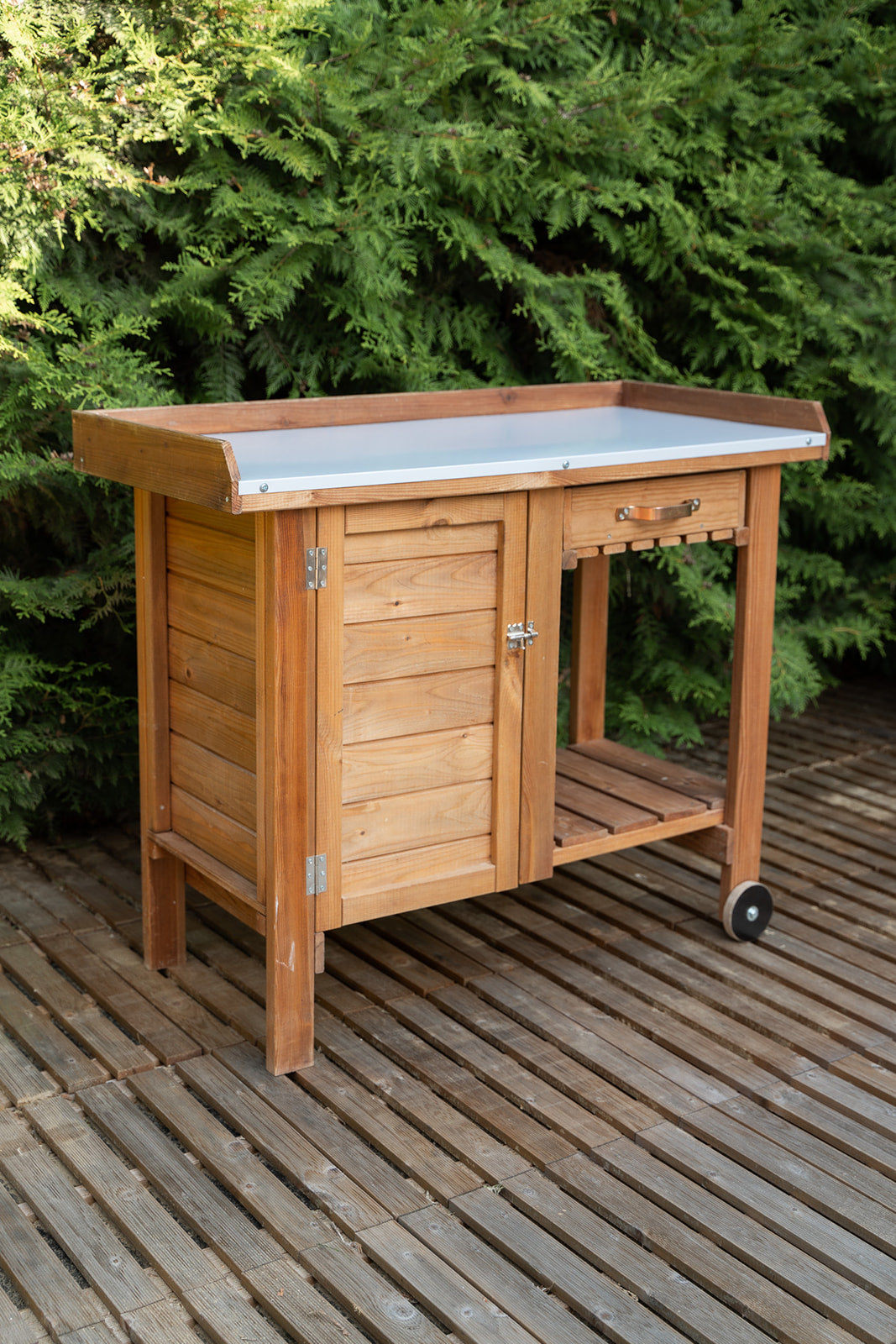 outdoor plant potting table Tierra Garden Gardener's Table with Wheels, Cabinet and Drawer
